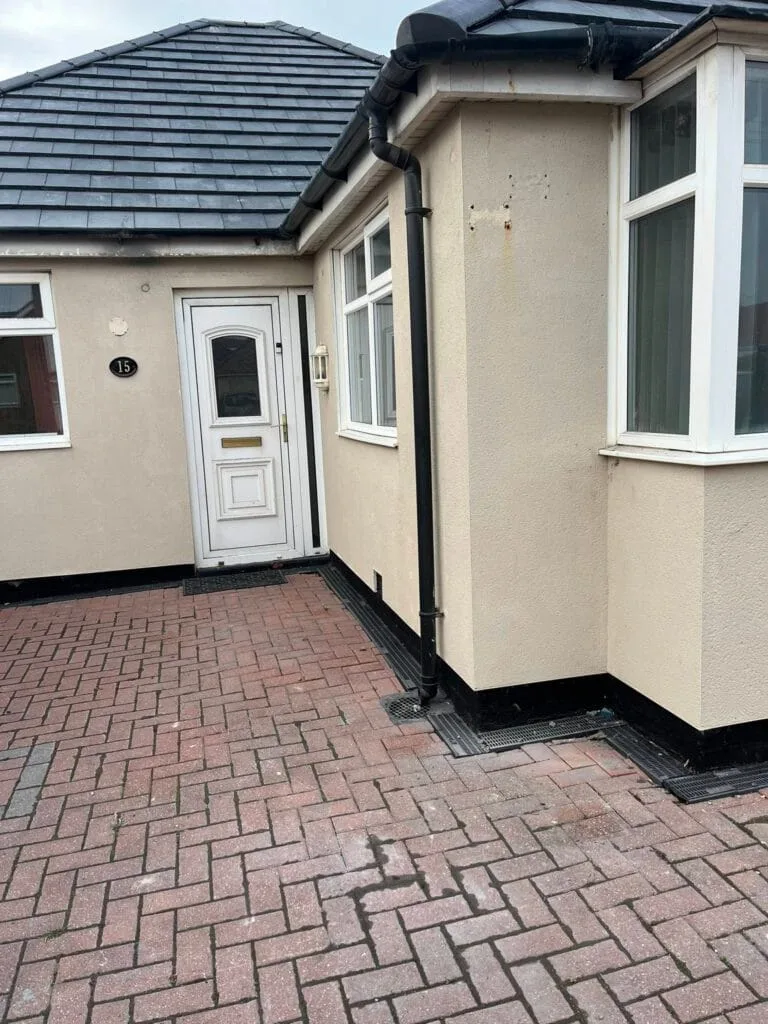Front entrance rendered bungalow driveway view UK