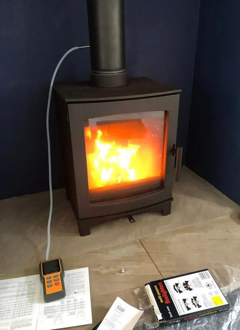 Wood burning stove installation with lit fire